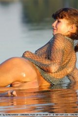 Ashley wet by the beach
